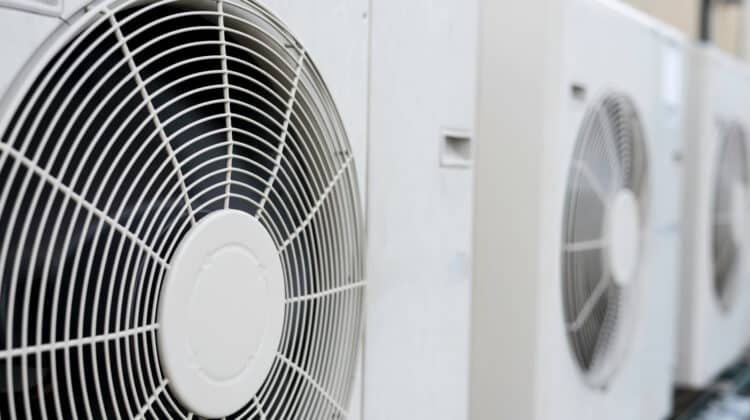Air conditioning industry concept close up of ductless coiled mini hvac air conditioner fan