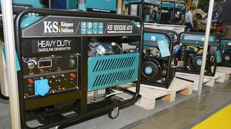 Large shop display of home standby diesel backup generators to deliver electricity during power outages