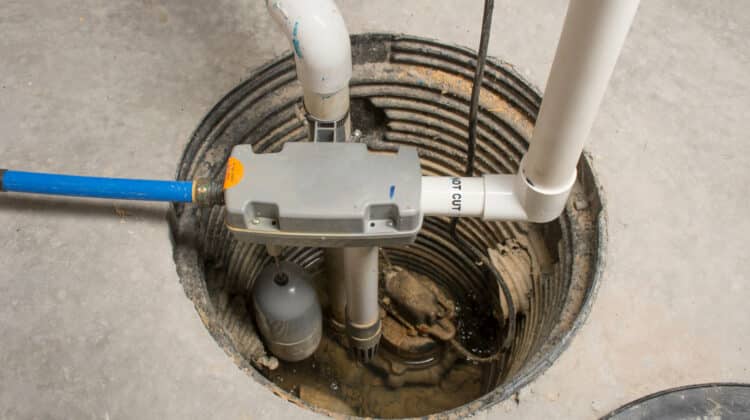 Plumbing and electrical system sump pump in basement installing water supply