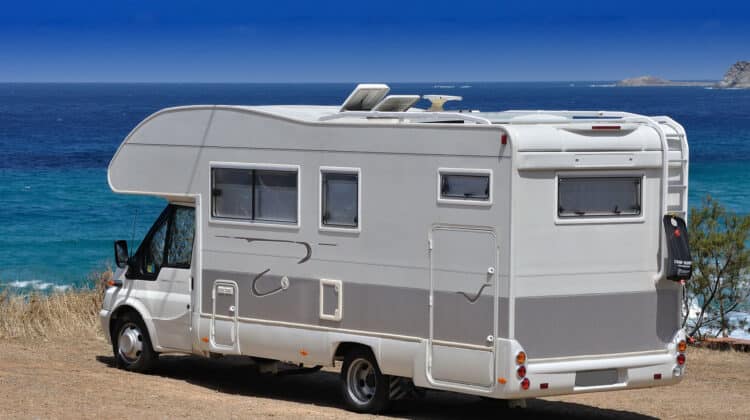Camper parked on the beach mobile home