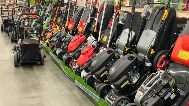 A variety of lawn mowers in the shop of machinery and goods for the garden