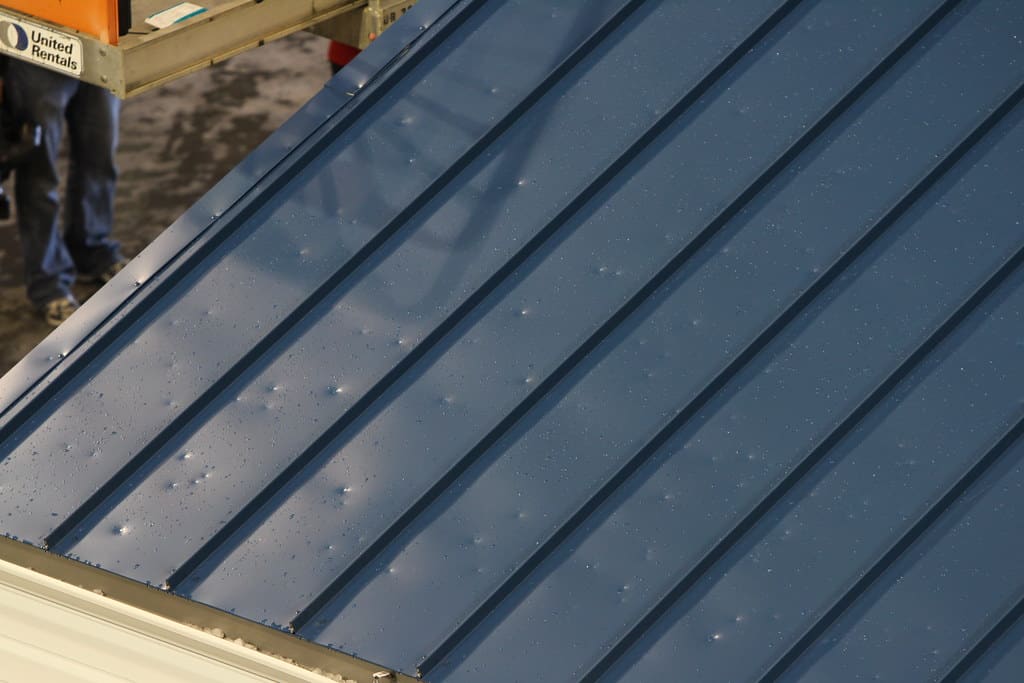 Everything You Need to Know About Metal Roof Hail Damage - Kyle's Garage