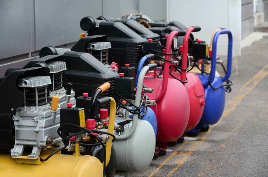Many new air compressors pressure pumps close up