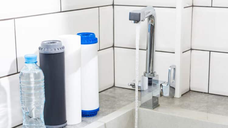 Water filter cartridge in the kitchen Drinking water filtration system in the kitchen Clean water at home