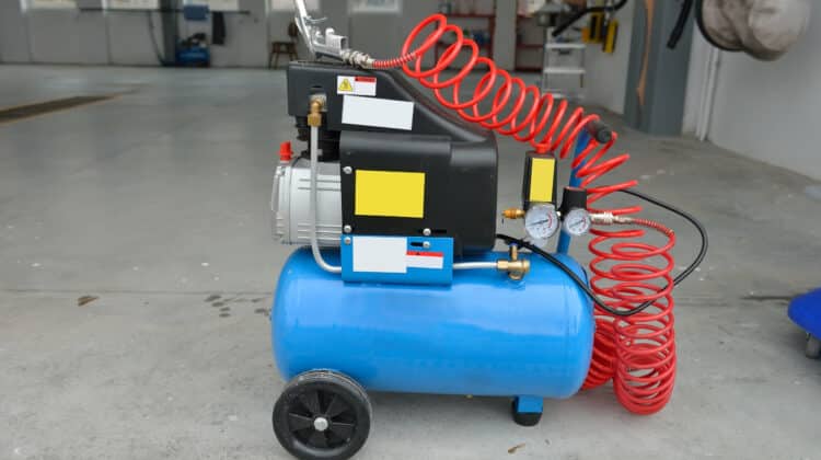 Blue pump compressor for washing cars indoor Cleaning concept