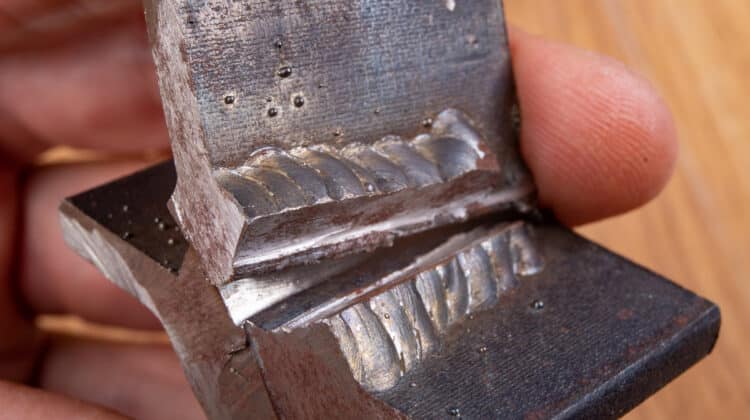 The fillet weld is rubbed with a angle grinder