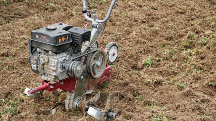 The power of rototiller plough is turned into a machine for cultivating cultivated land in a garden