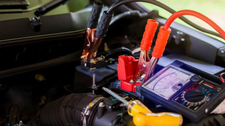 Selective focus of mechanic working with multimeter