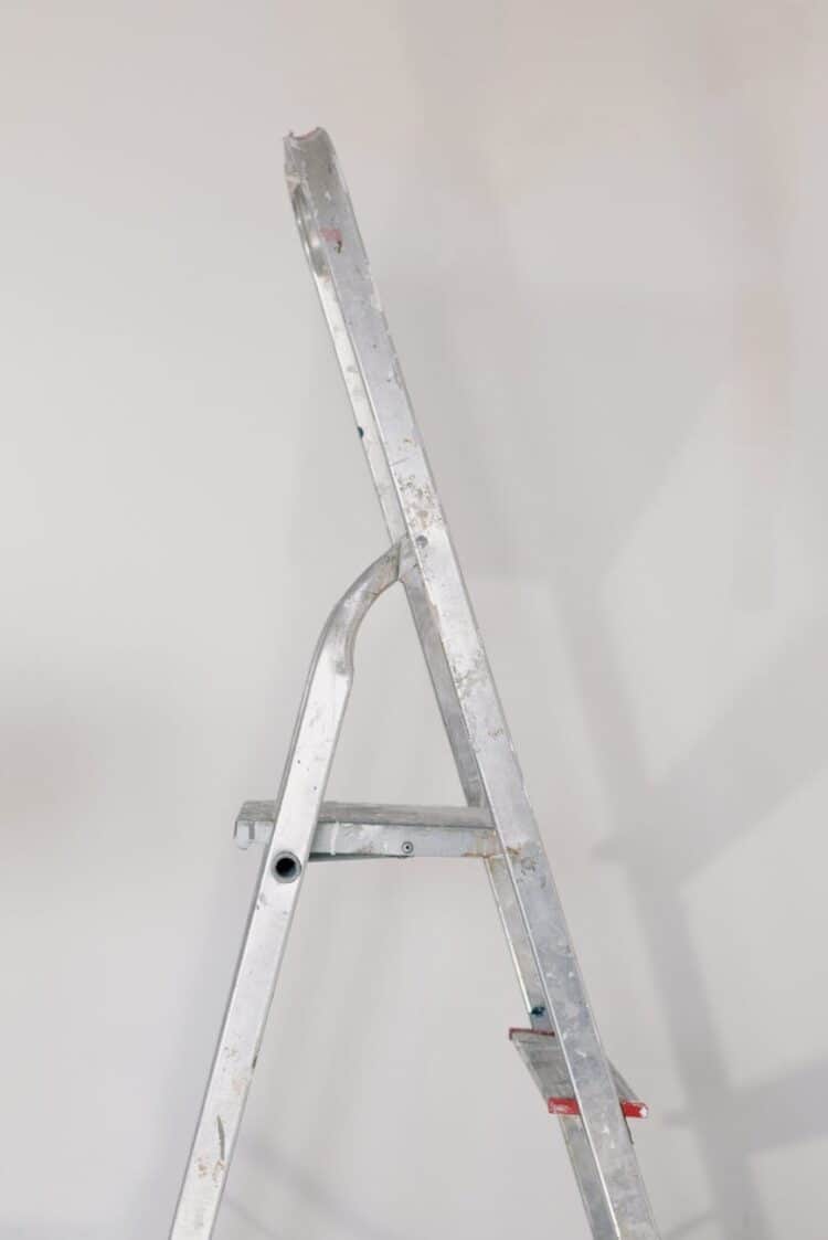 how to put a ladder on a sloped roof