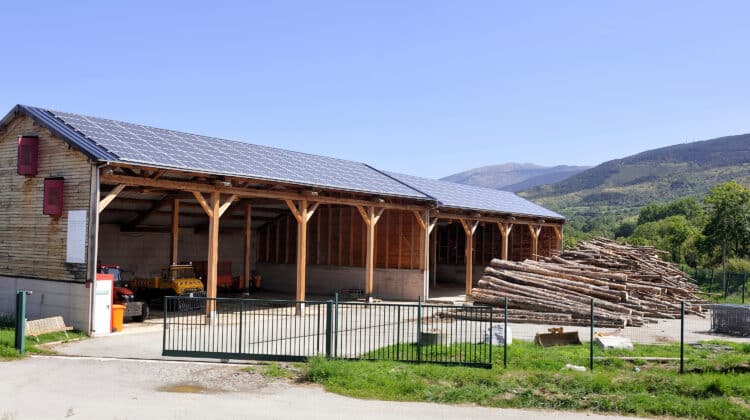solar roof of a large surface on a municipal building of a small village in the Pyrenees