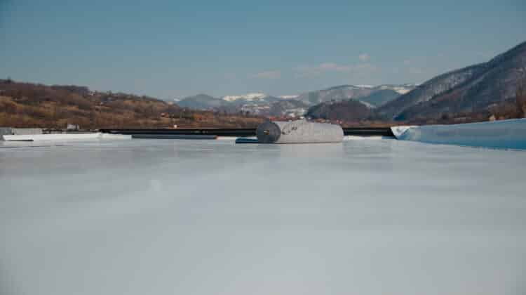 Geotextile support layer for PVC and EPDM synthetic membrane roof
