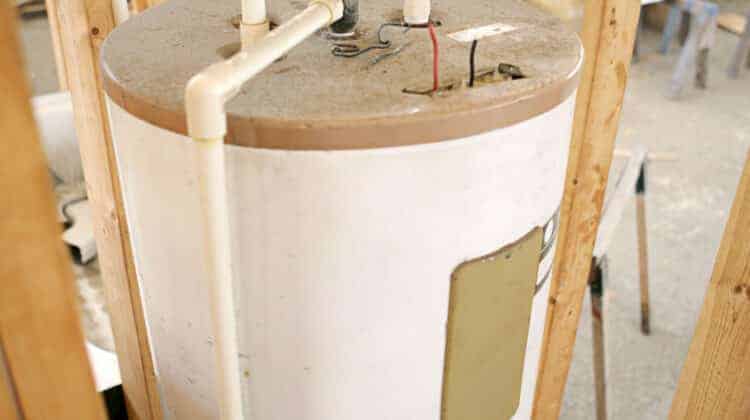 Construction site with hot water heater installed Focus on center top of water heater