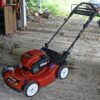 how to drain gas from lawn mower