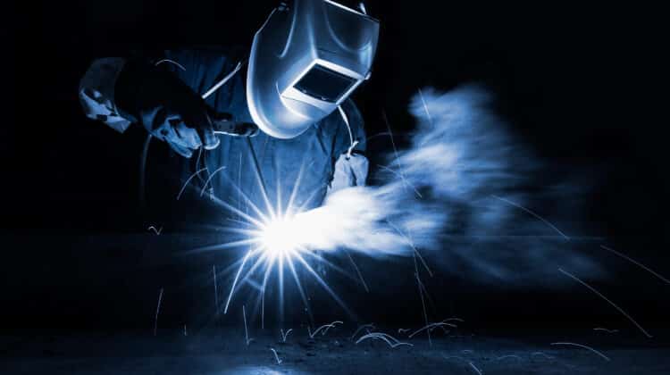 Closeup industrial Worker at the factory welding