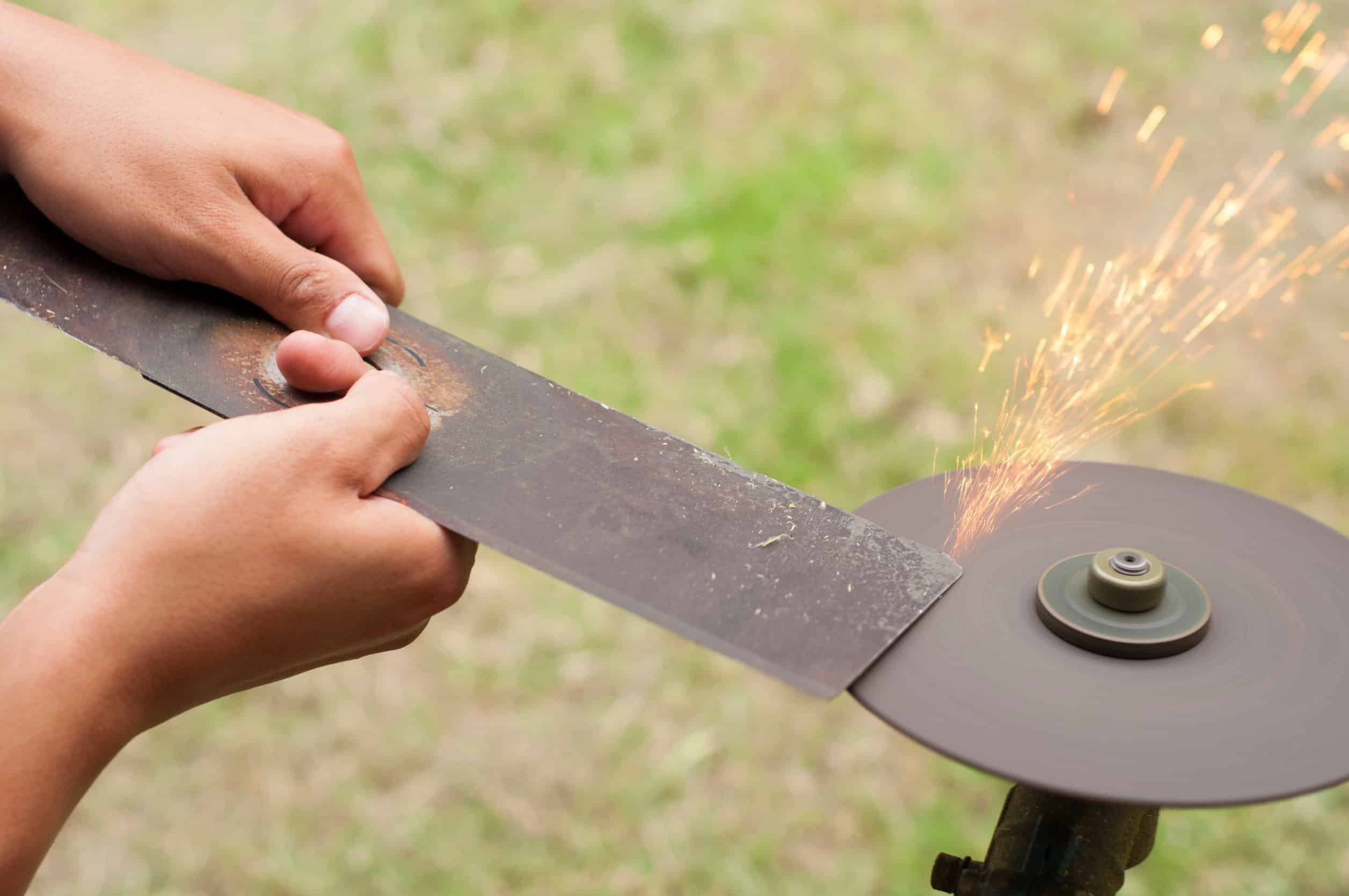How to sharpen lawnmower blades with a bench grinder
