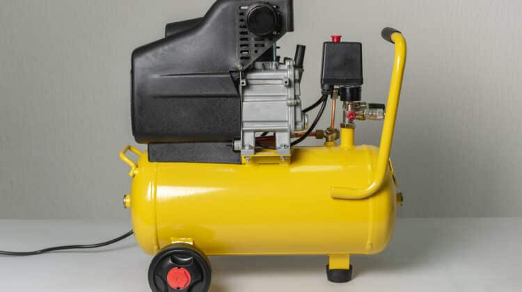 Yellow Piston Air Compressor Compressing and Supplying Air Machine